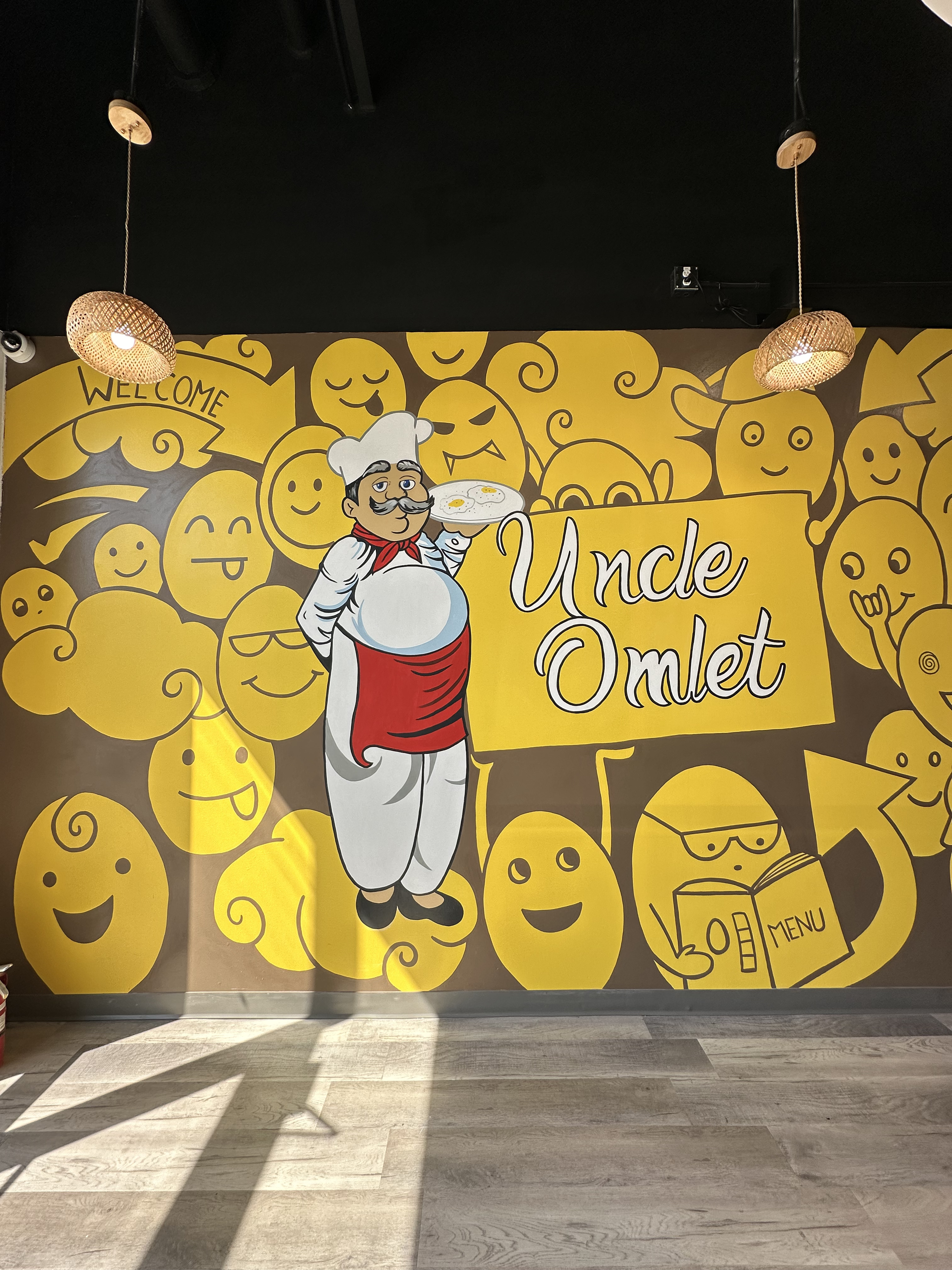 Close up of chef character on Uncle Omlet mural