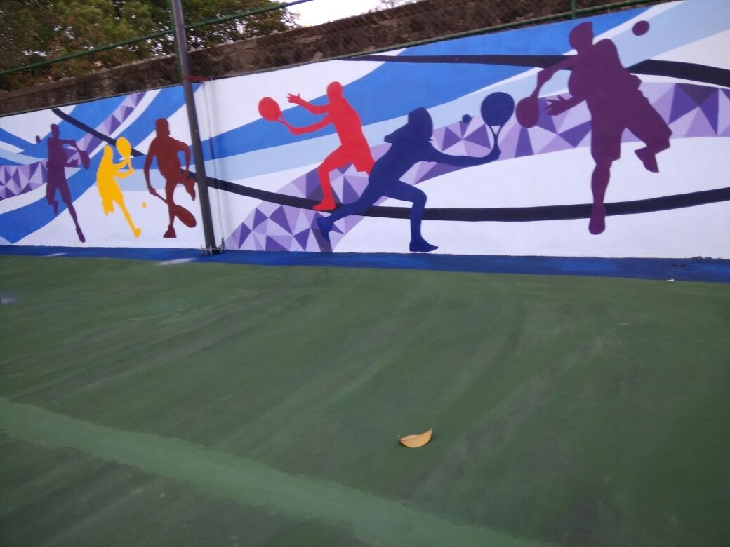 Close up of athletes on outdoor sports court mural